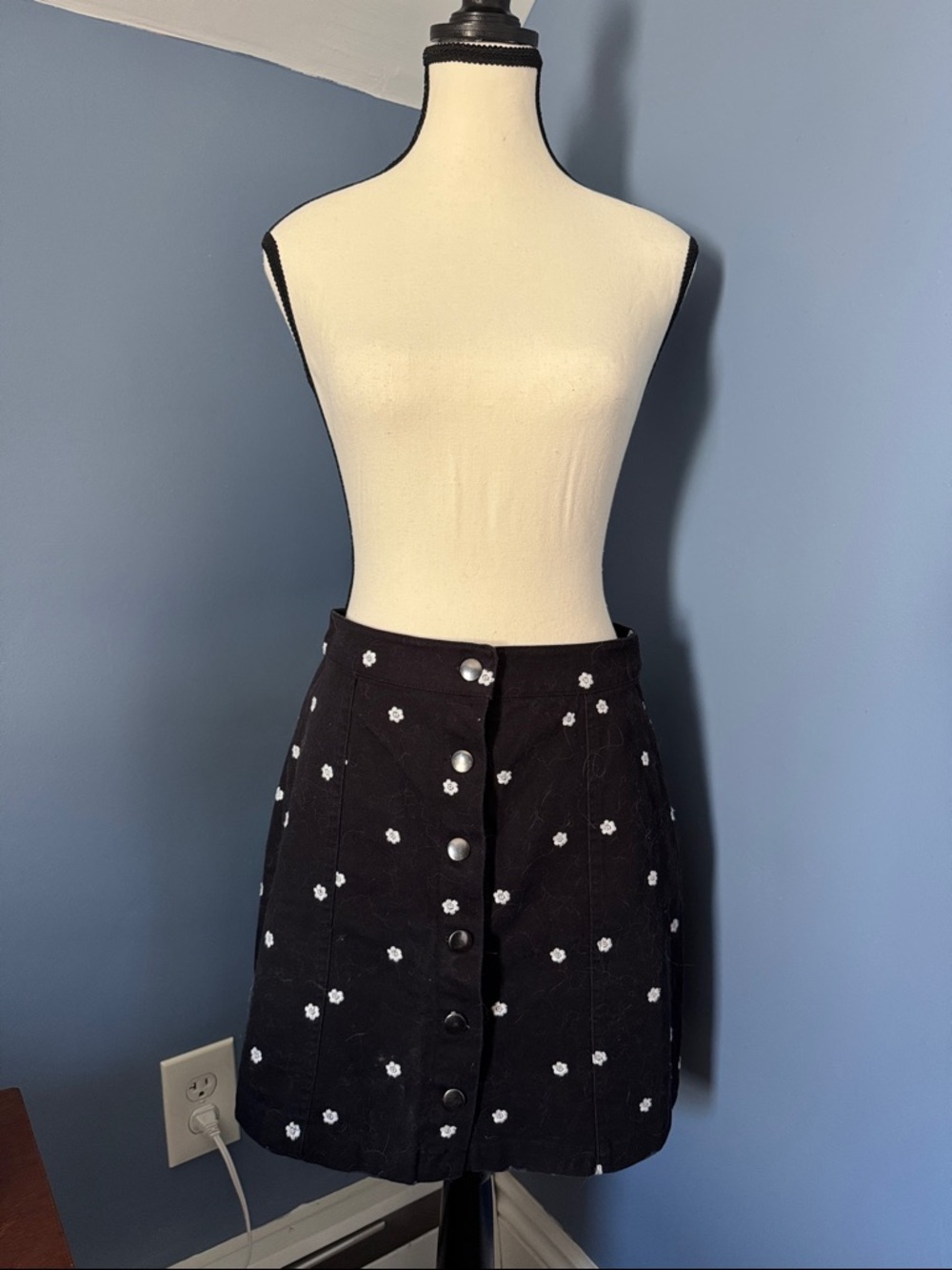 Black A-Line Button-Front Mini Skirt with White Floral Embroidery
